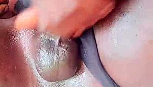 sexyjayla254 strokes her oiled ebony shemale monster outside solo watch her cum