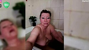 Aimee shaves her hairless pussy while jerking off mature slut close-up in bathroom