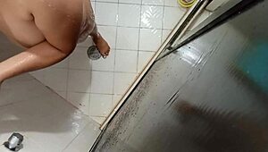 Voyeur catches CURLY chubby CUÑADA stripping in the SHOWER voyeur style