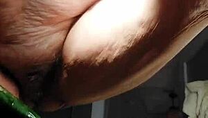 OMA FUCKS HAIRY PUSSY WITH CUCUMBER