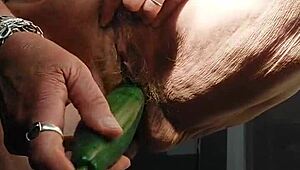 OMA FUCKS HAIRY PUSSY WITH CUCUMBER