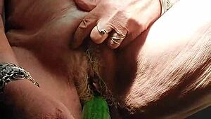 OMA FUCKS HAIRY PUSSY WITH CUCUMBER