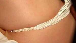 Hubby pulls aside wife's satin panties and pumps her full of creampie in their bed