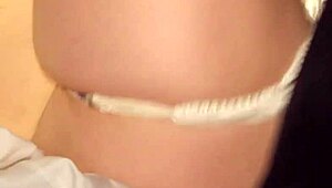 Hubby pulls aside wife's satin panties and pumps her full of creampie in their bed