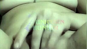 Brazilian cutie rams black dildo deep in her tight amateur ass on bed.