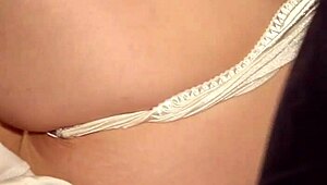 Hubby pulls aside wife's satin panties and pumps her full of creampie in their bed