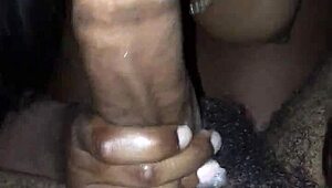 The young black teen gulps down cock with sloppy deepthroat action in homemade vid