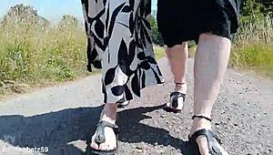 barefoot birkenstocks stroll in nature