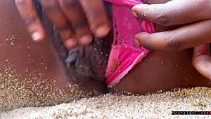 couple bangs wildly on beach vacation opener