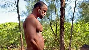 Bombadão rips clothes off muscular Brazilian bodybuilder's huge ass on country trail