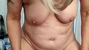 Naughty Housewife Orgasms Hard on Homemade Dildo Tit Play