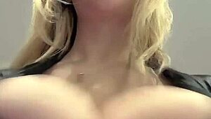 juicy milf boobs strain against tight elastic leather top