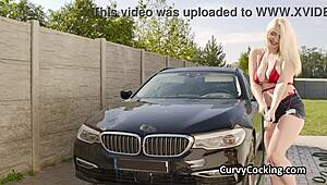 Girlfriend's massive tits get tittyfucked hard while cleaning the car