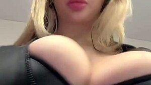 juicy milf boobs strain against tight elastic leather top