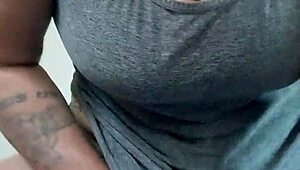 tattooed brunette wife squeezes dildo between natural tits then fucks it hard