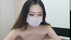 chinese beauty pours fresh milk over her perky asian tits seductively