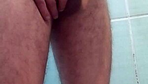 watch me stroke my big cock hard while bathing for that hot cumshot finish