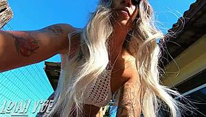 Hot Brazilian girls kiss teasingly outdoors