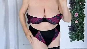 This horny busty gilf in stockings spreads wet pussy teasing big natural tits