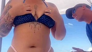 young african crossdresser flashes swollen pussy and monster cock on crowded beach