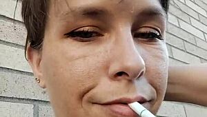 kelly kendricks' huge cleavage tits burst out while smoking cigarette outdoors in sun!