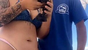 young african crossdresser flashes swollen pussy and monster cock on crowded beach