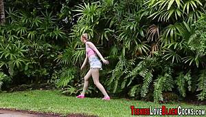 Cute teen slurps massive interracial cock eagerly