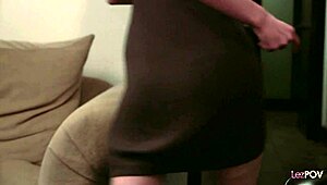 rude redhead boss straps on and rams her submissive brunette employee's shaved pussy hard