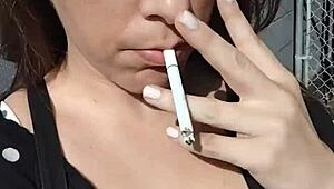 kelly kendricks' huge cleavage tits burst out while smoking cigarette outdoors in sun!