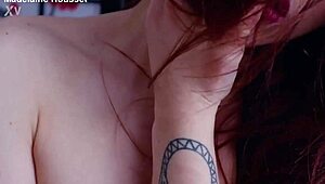 Redhead teases in nylon stockings with toys and ballgags