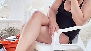 curvy mature wife flashes huge tits on public beach vacation for hubby