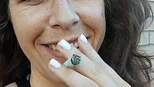 kelly kendricks' huge cleavage tits burst out while smoking cigarette outdoors in sun!