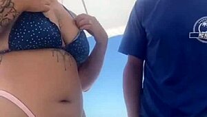 young african crossdresser flashes swollen pussy and monster cock on crowded beach