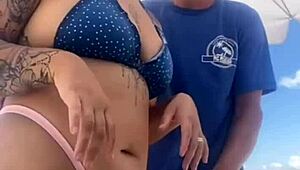 young african crossdresser flashes swollen pussy and monster cock on crowded beach