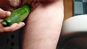 granny fucks hairy pussy with thick cucumber!!