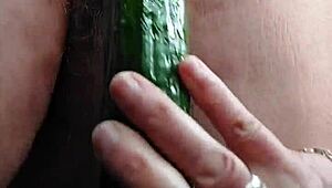 granny fucks hairy pussy with thick cucumber!!