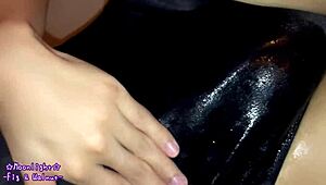 whoops my lotion slick navy swimsuit clings while i stroke myself silly