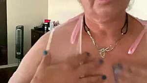 guy gropes hot babe's massive tits in steamy closeup action