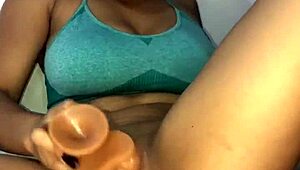 Young latina's big natural tits bounce during solo dildo ride