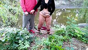 Horny stepmother milks stepson's cock after masturbating wet pussy outdoors