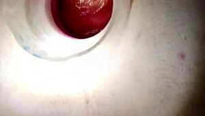 Watch this gaping anal stretch wide open for deep insertions