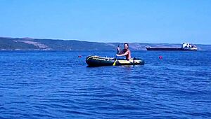 Volga river boat ride turns erotic as mature bikini babe poses outdoors