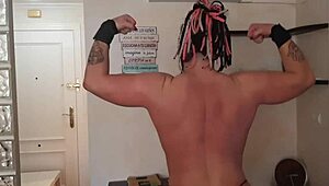 Muscular Oiled Bodybuilder Flexes Huge Tits Ass and Big Clit