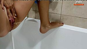 Golden Rain Femdom Teases Piss and Shaved Pussy in Episode 833