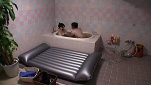 married japanese lesbians finger each other's wet pussies and lick in passionate wedding night bliss