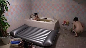 married japanese lesbians finger each other's wet pussies and lick in passionate wedding night bliss