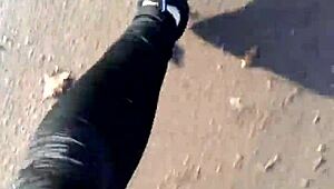 german chick struts in new barefoot shoes outdoors leggings tight