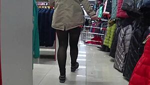 ever seen a gorgeous ass in pantyhose? spy cam catches her peeking skirt in store
