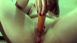 Juicy pussy and ass stretched wide by huge carrots dp