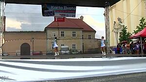 Two nice majorettes showcase cheerleader charm and precision moves